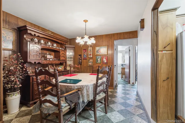 a kitchen with a stove a sink and a refrigerator