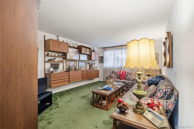 a kitchen with granite countertop cabinets stainless steel appliances and a sink