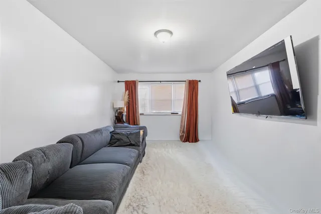 a bedroom with a bed and a table