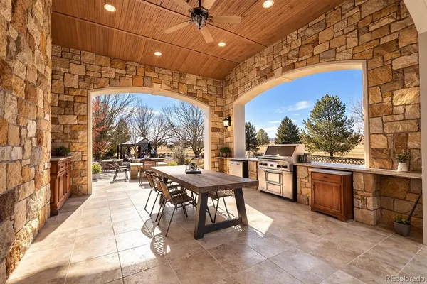 a outdoor space with lots of table and chairs