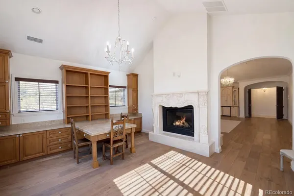 a livingroom with furniture window and wooden floor