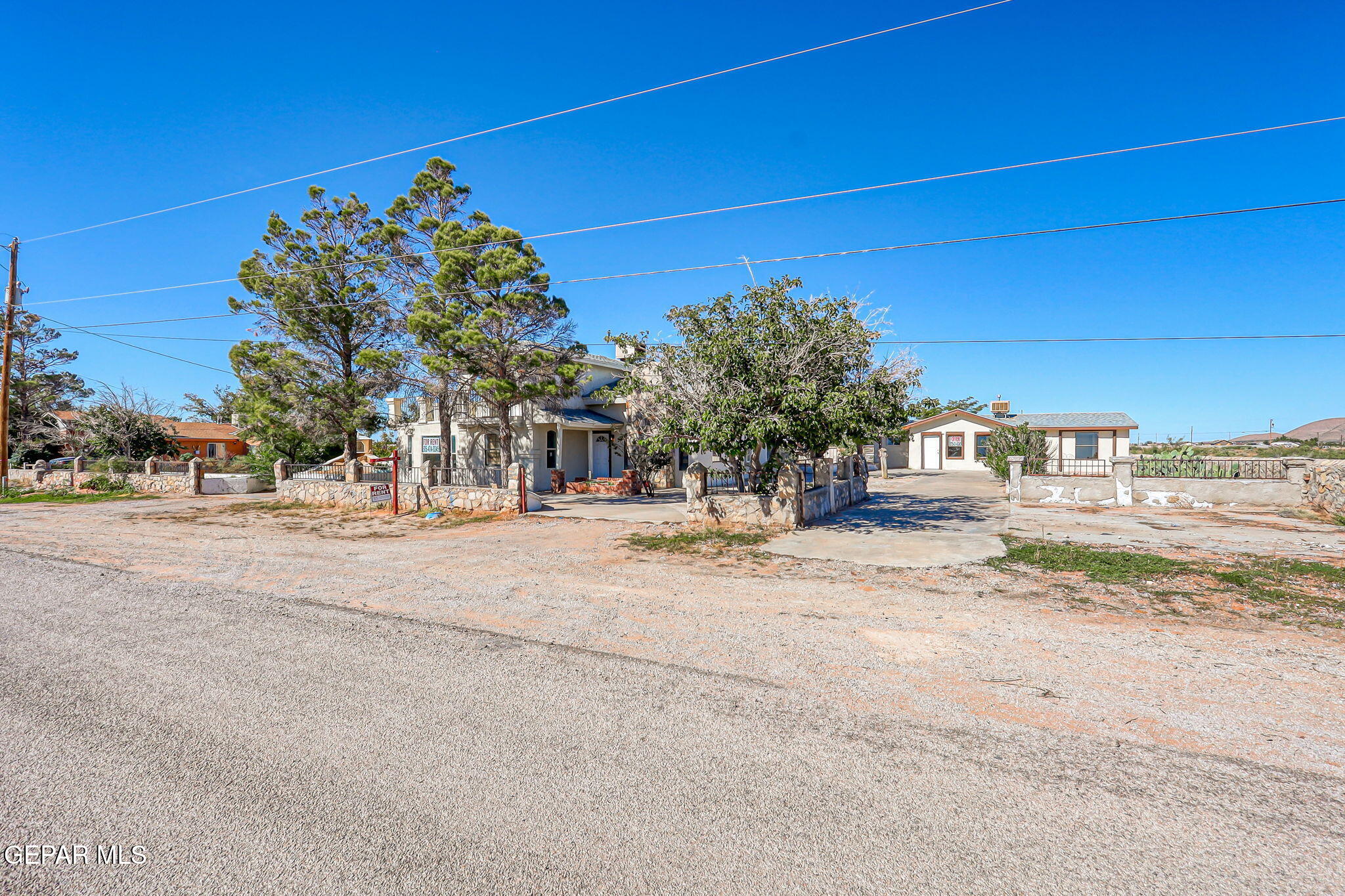 14573 B Van Fleet Road El Paso, TX 79938 - Photo 107 of 128 a view of road with a building in the background