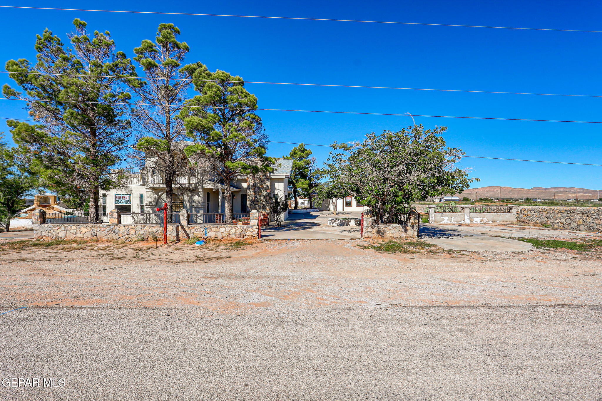 14573 B Van Fleet Road El Paso, TX 79938 - Photo 110 of 128 a view of a road with a building in the background