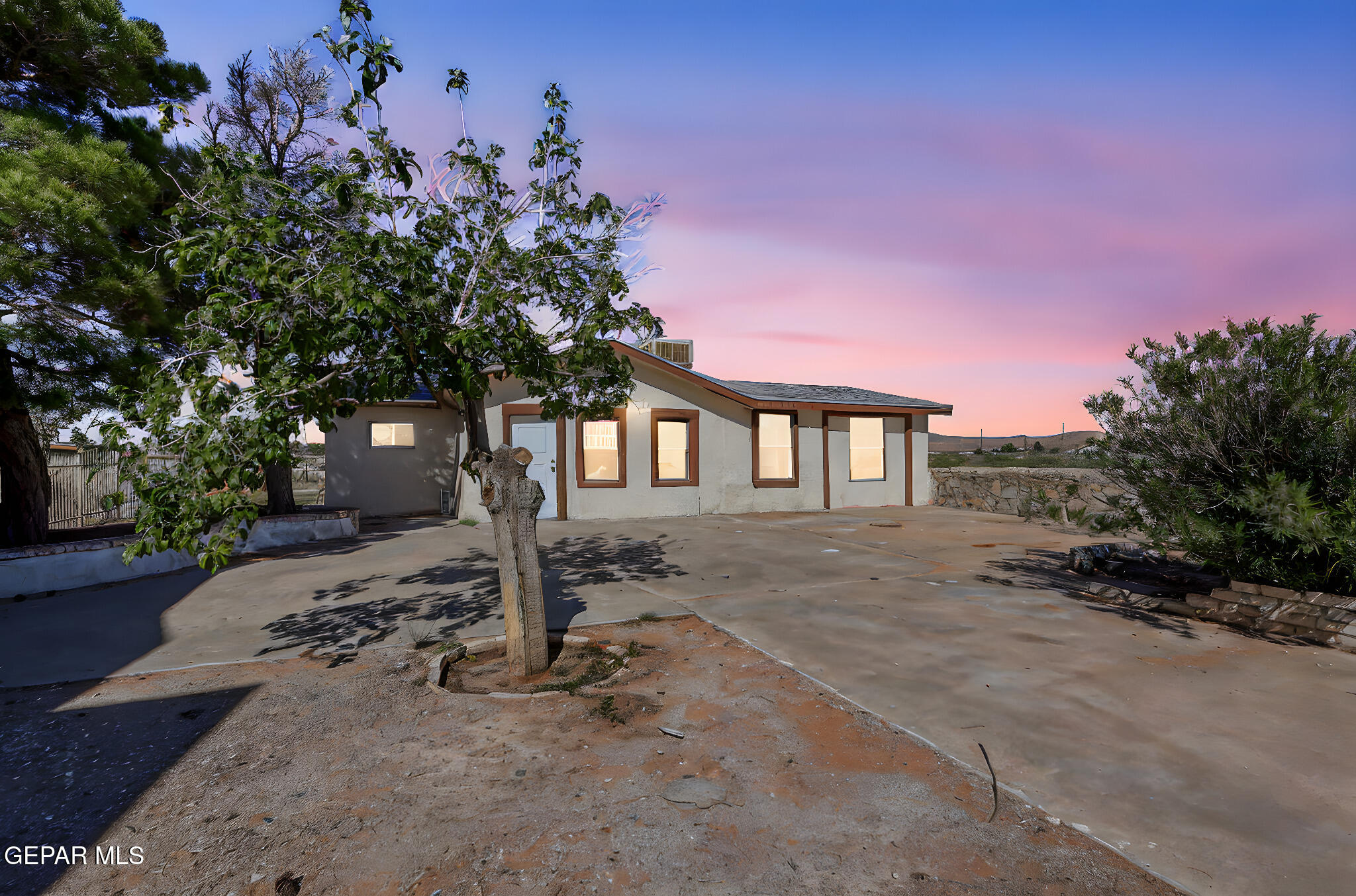 14573 B Van Fleet Road El Paso, TX 79938 - Photo 117 of 128 a front view of a house with a yard