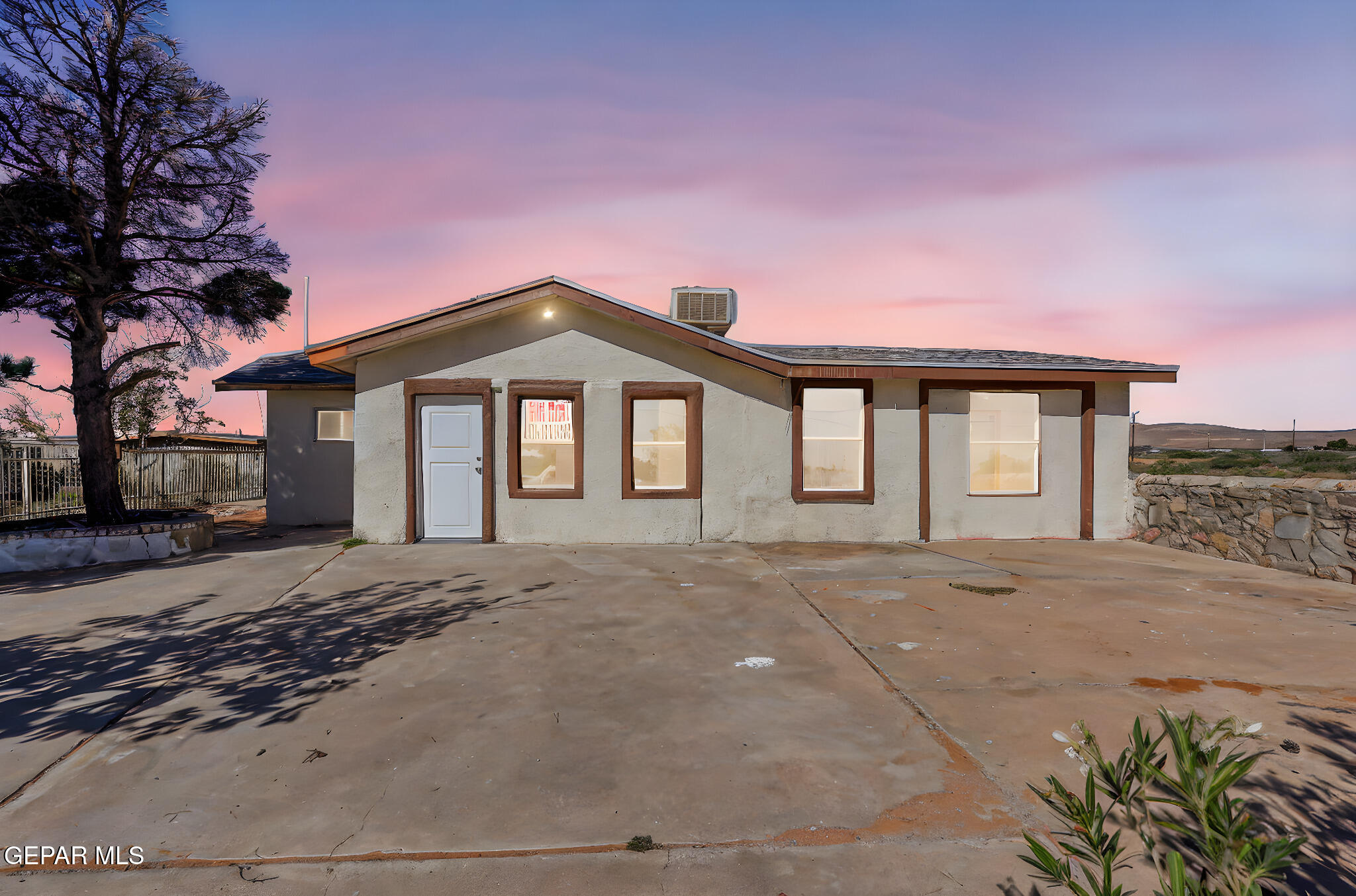 14573 B Van Fleet Road El Paso, TX 79938 - Photo 119 of 128 a front view of a house with a yard