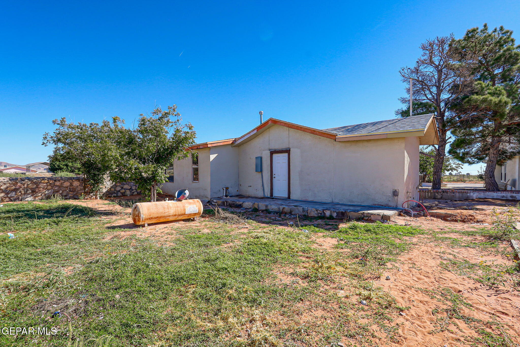 14573 B Van Fleet Road El Paso, TX 79938 - Photo 122 of 128 a backyard of a house with table and chairs