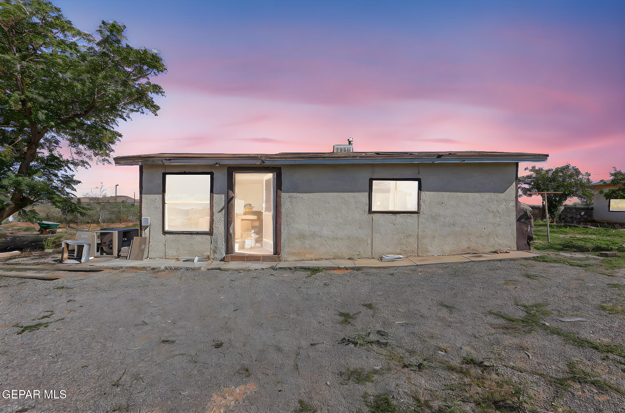 14573 B Van Fleet Road El Paso, TX 79938 - Photo 126 of 128 a front view of a house with a yard