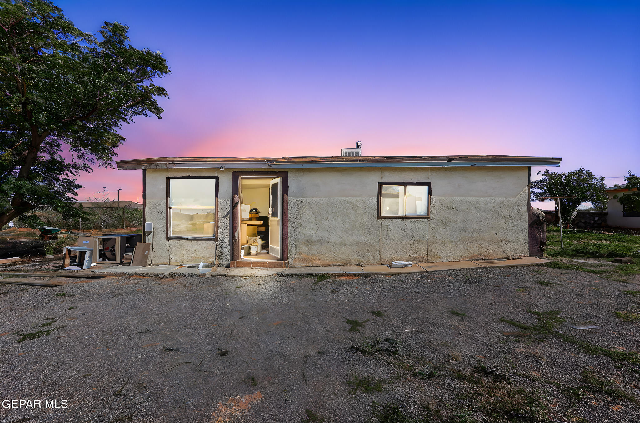 14573 B Van Fleet Road El Paso, TX 79938 - Photo 4 of 128 a front view of a house with a yard