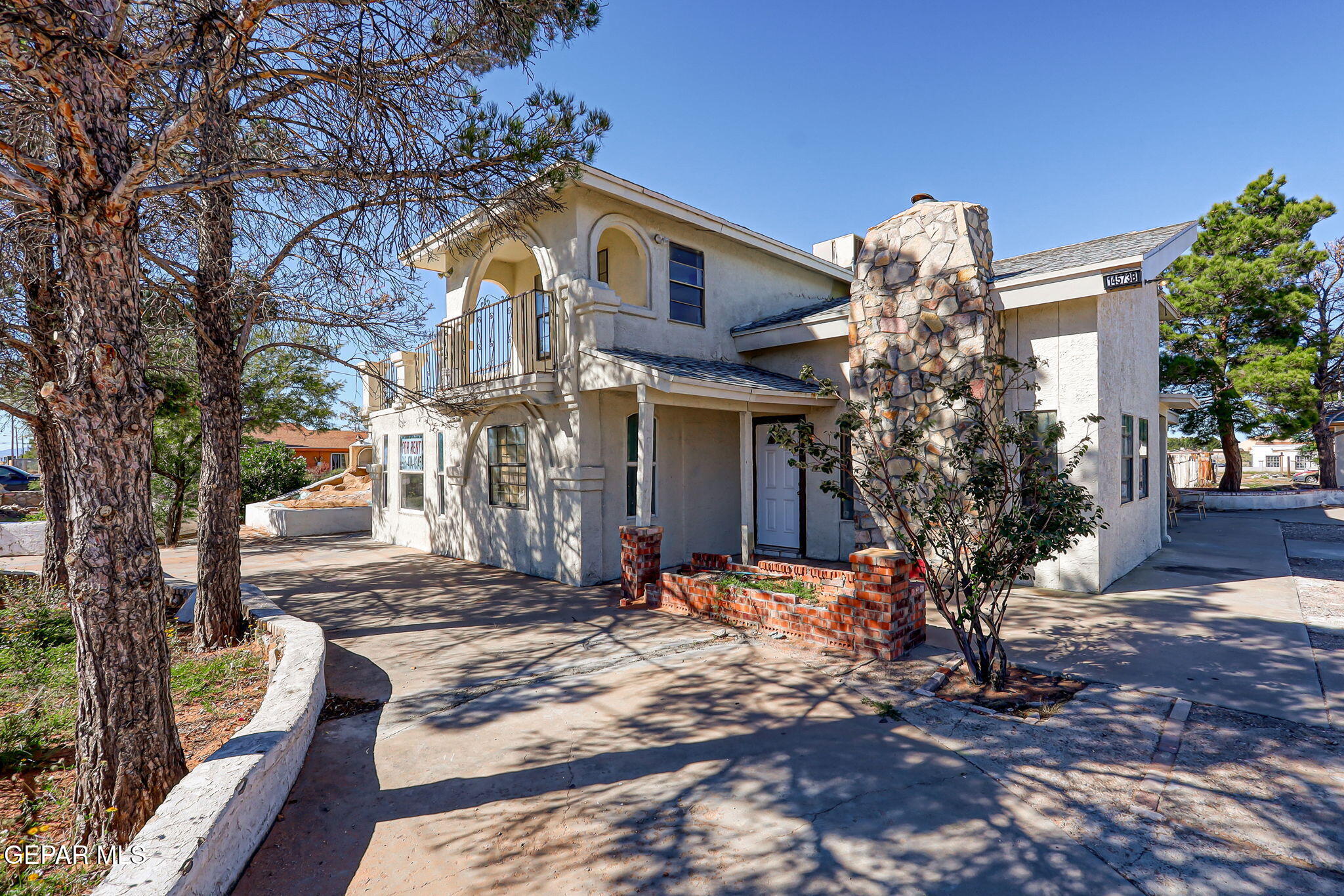 14573 B Van Fleet Road El Paso, TX 79938 - Photo 44 of 128 a front view of a house with a tree