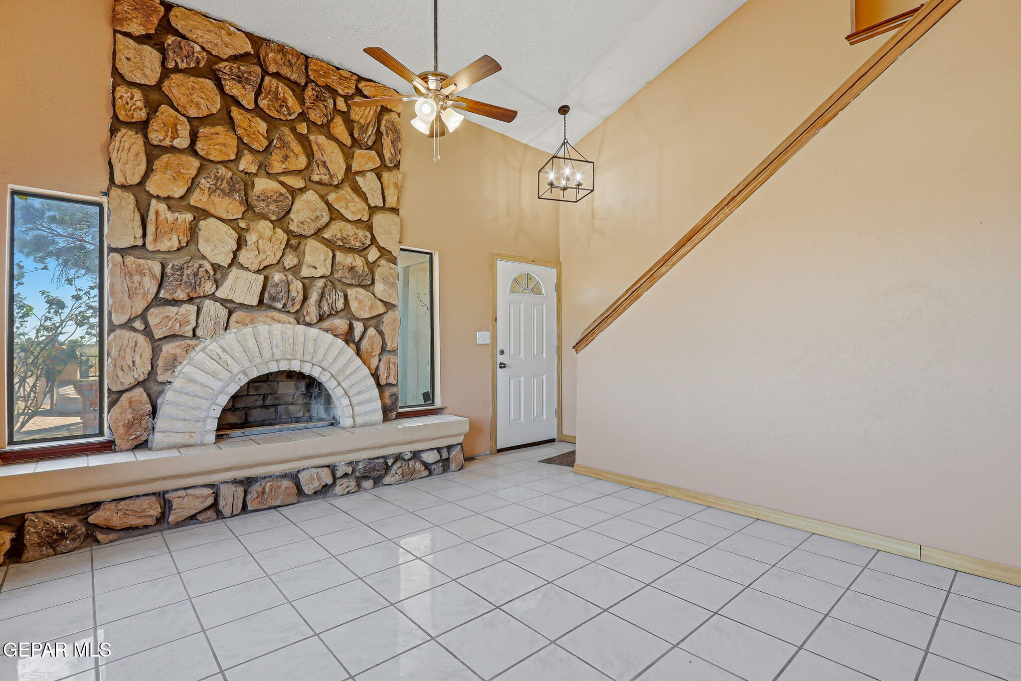 14573 B Van Fleet Road El Paso, TX 79938 - Photo 6 of 128 a view of entryway with a fireplace and a rug