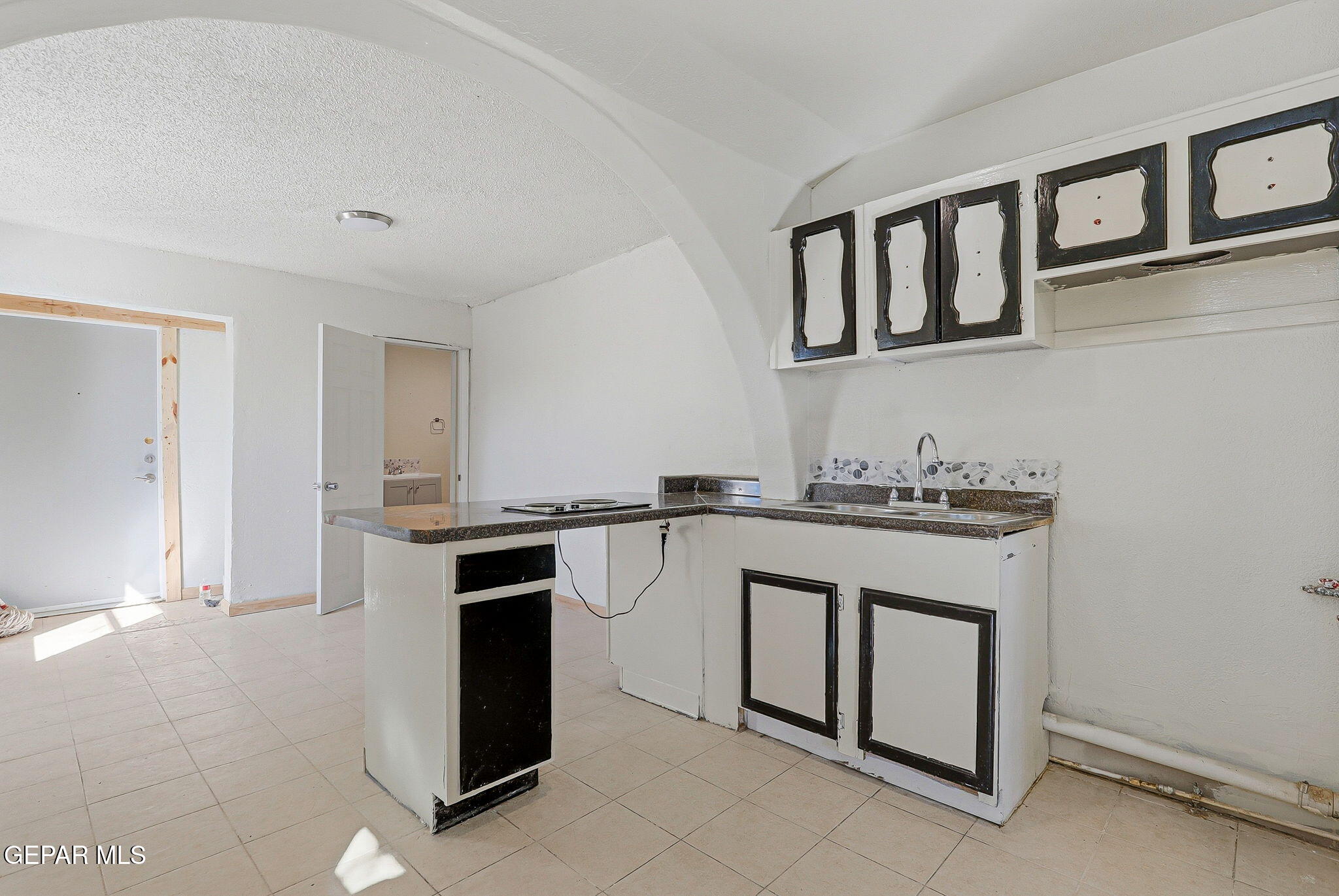 14573 B Van Fleet Road El Paso, TX 79938 - Photo 63 of 128 a kitchen with stainless steel appliances granite countertop a stove and a sink