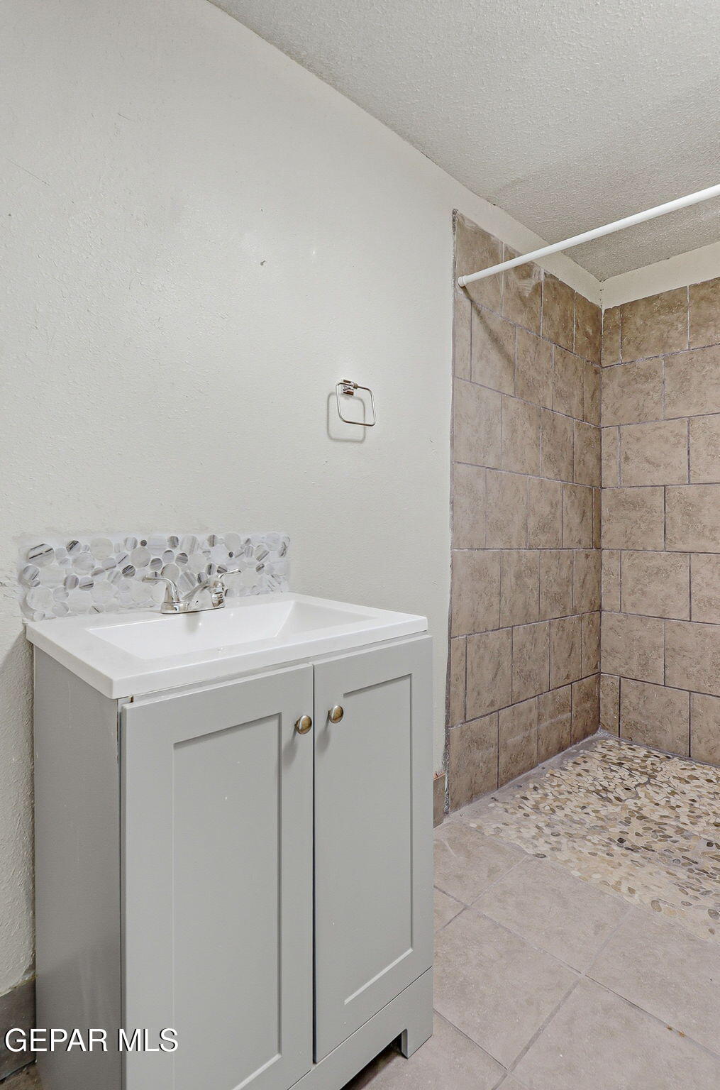 14573 B Van Fleet Road El Paso, TX 79938 - Photo 66 of 128 a bathroom with a sink and a mirror