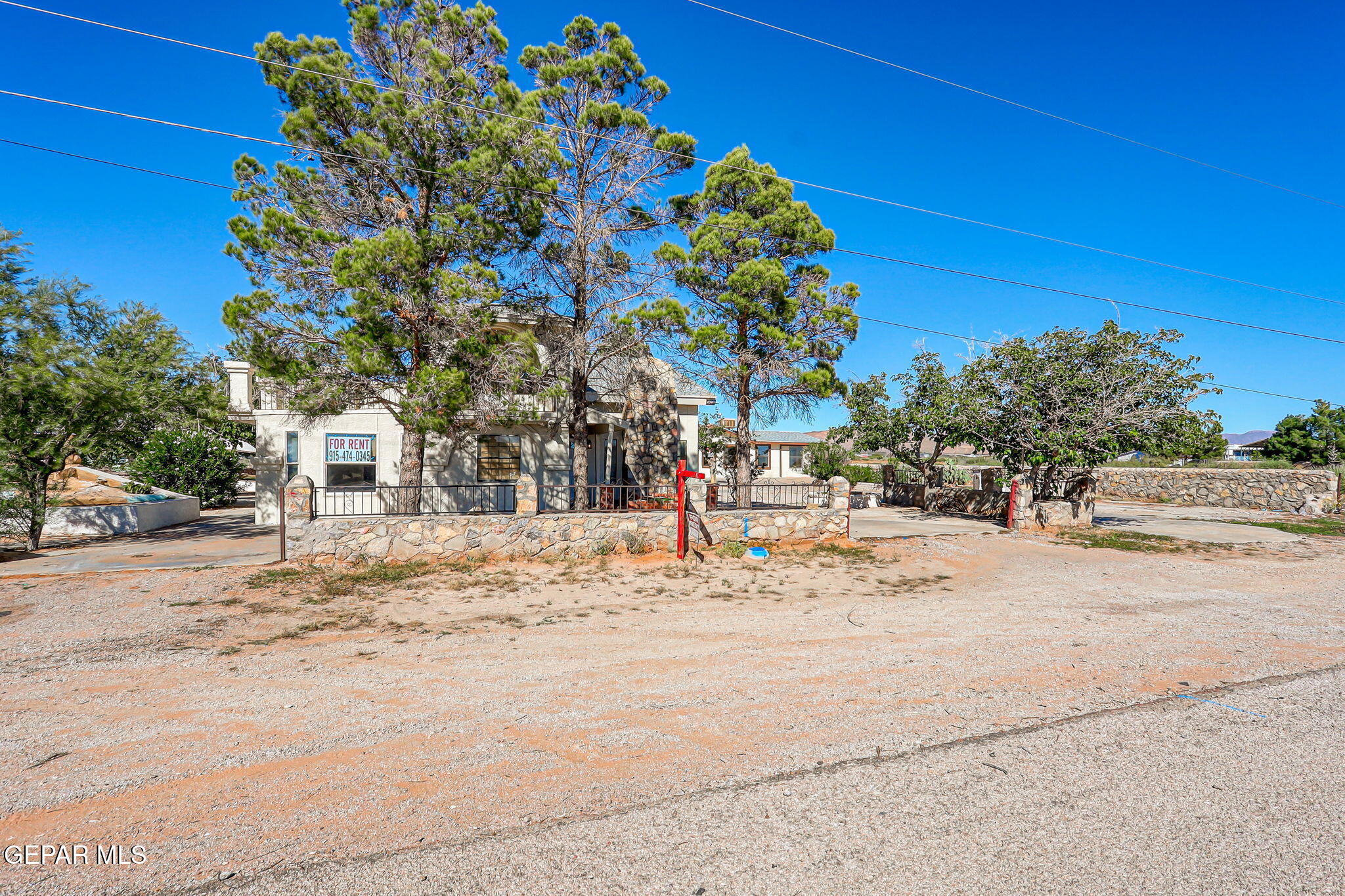 14573 B Van Fleet Road El Paso, TX 79938 - Photo 74 of 128 a view of a road with a building in the background