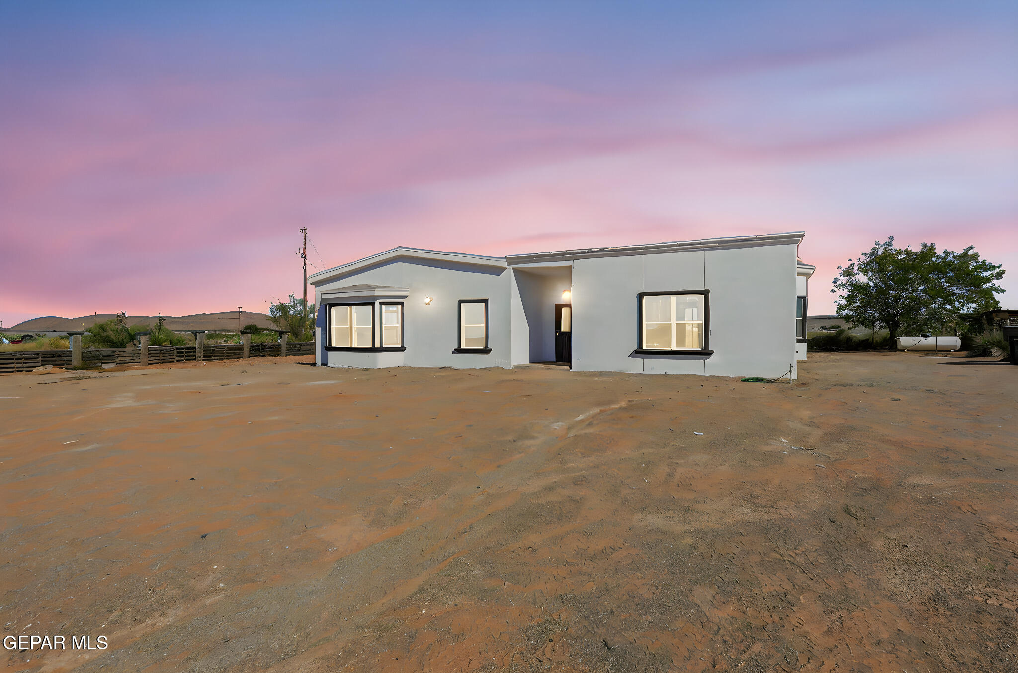 14573 B Van Fleet Road El Paso, TX 79938 - Photo 77 of 128 a house with swimming pool in front of it
