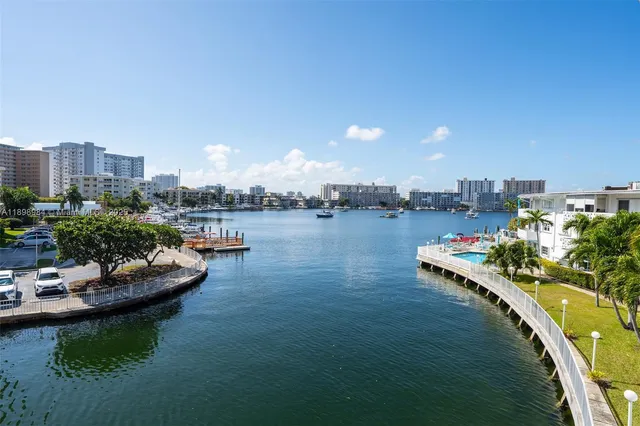 a view of a swimming pool with chairs