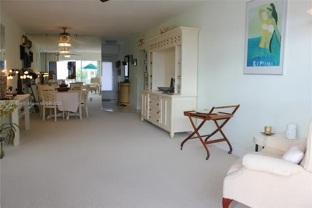 a kitchen with a sink appliances and cabinets