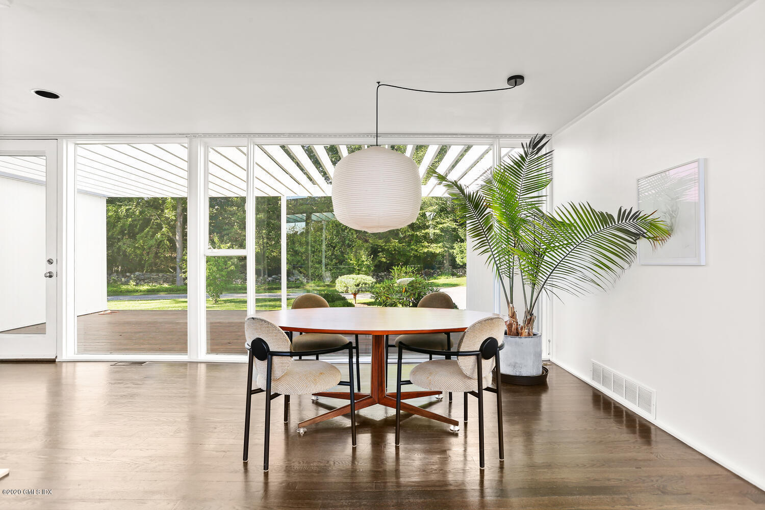 26 Chalburn Road Redding, CT 06896 - Photo 3 of 19 a dining room with furniture window and wooden floor