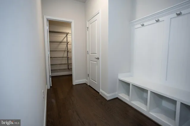 a kitchen with stainless steel appliances a refrigerator sink and cabinets