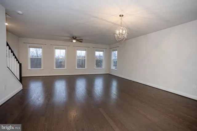 a view of a car park in front of a house