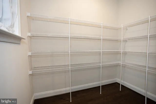 a bathroom with a shower and a sink