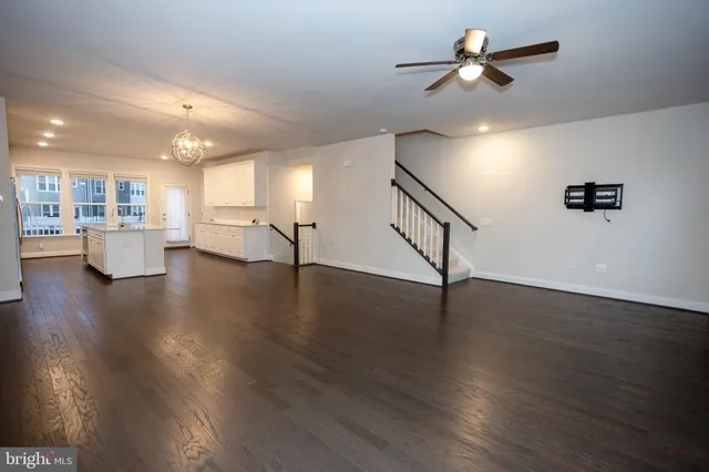 a bathroom with a sink a mirror and a shower