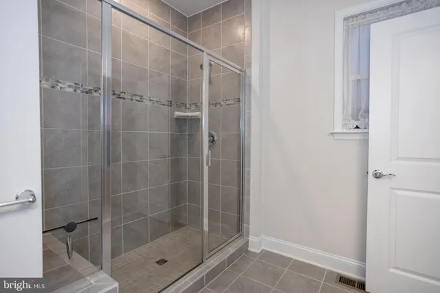 a bathroom with a sink a toilet a mirror and vanity