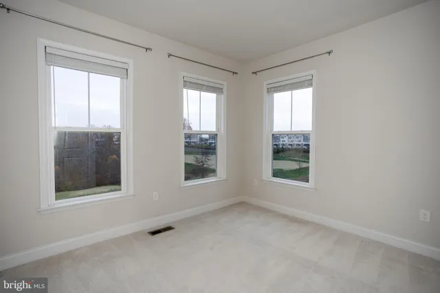 a view of balcony with furniture
