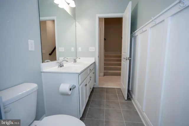 a view of a car park in front of house