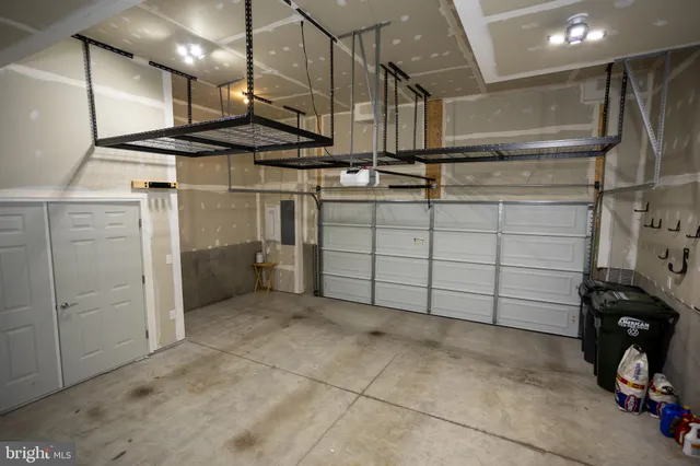 a view of a swimming pool and lounge chairs