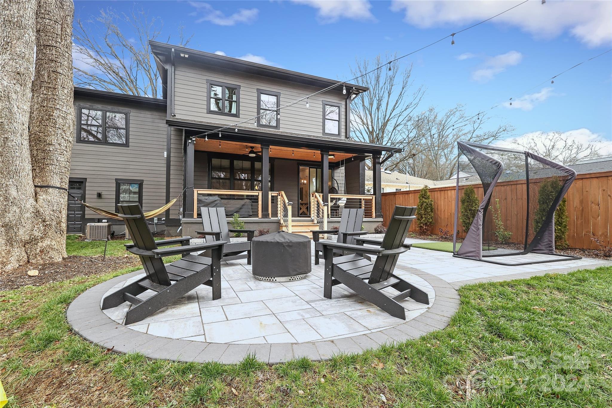 1300 Cortland Road West Charlotte, NC 28209 - Photo 46 of 48 a view of a house with backyard and sitting area