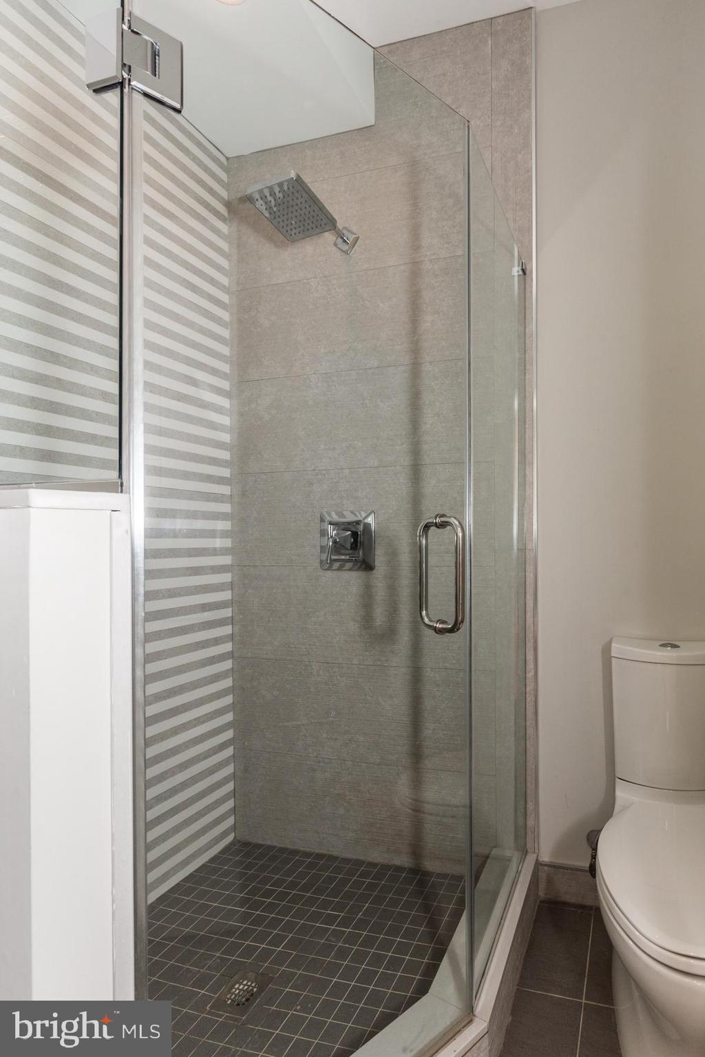 1815 Ranstead Street, Unit 1 Philadelphia, PA 19103 - Photo 18 of 27 a bathroom with a toilet and a shower