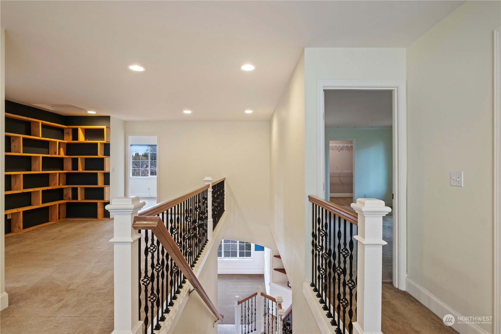 8624 South 133rd Place Renton, WA 98178 - Photo 17 of 39 wooden floor with windows and stairs