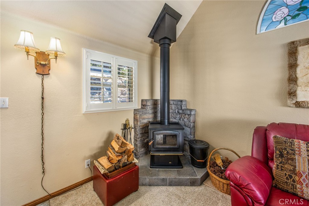 1134 Scenic Way Rimforest, CA 92378 - Photo 6 of 37 Wood Burning Stove keeps it Cozy on those Cold Nights
