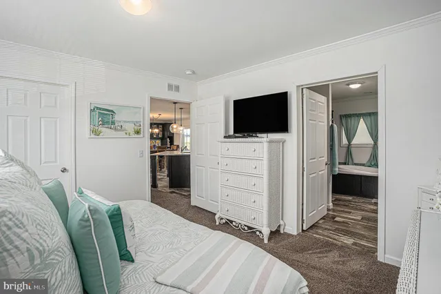 a room with furniture and a flat screen tv