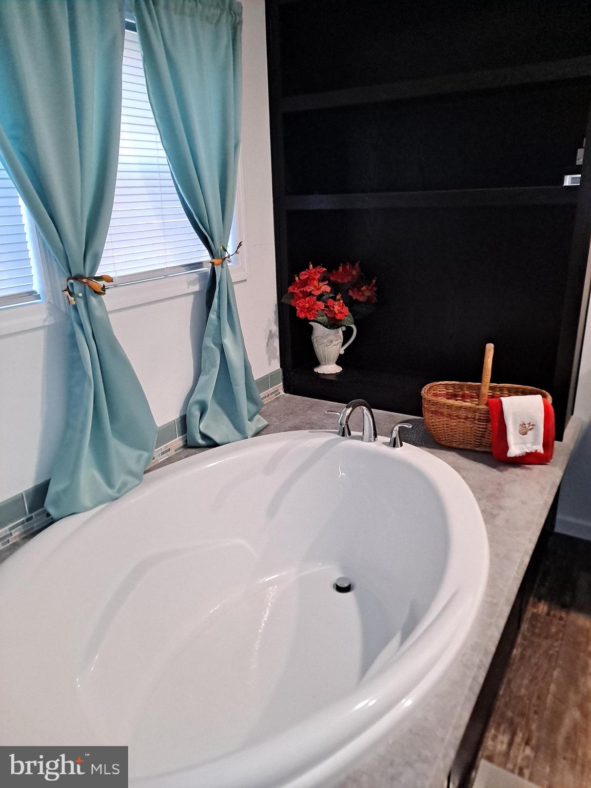 906 Lakeview Drive Green Lane, PA 18054 - Photo 20 of 37 a bathroom with a sink and a mirror