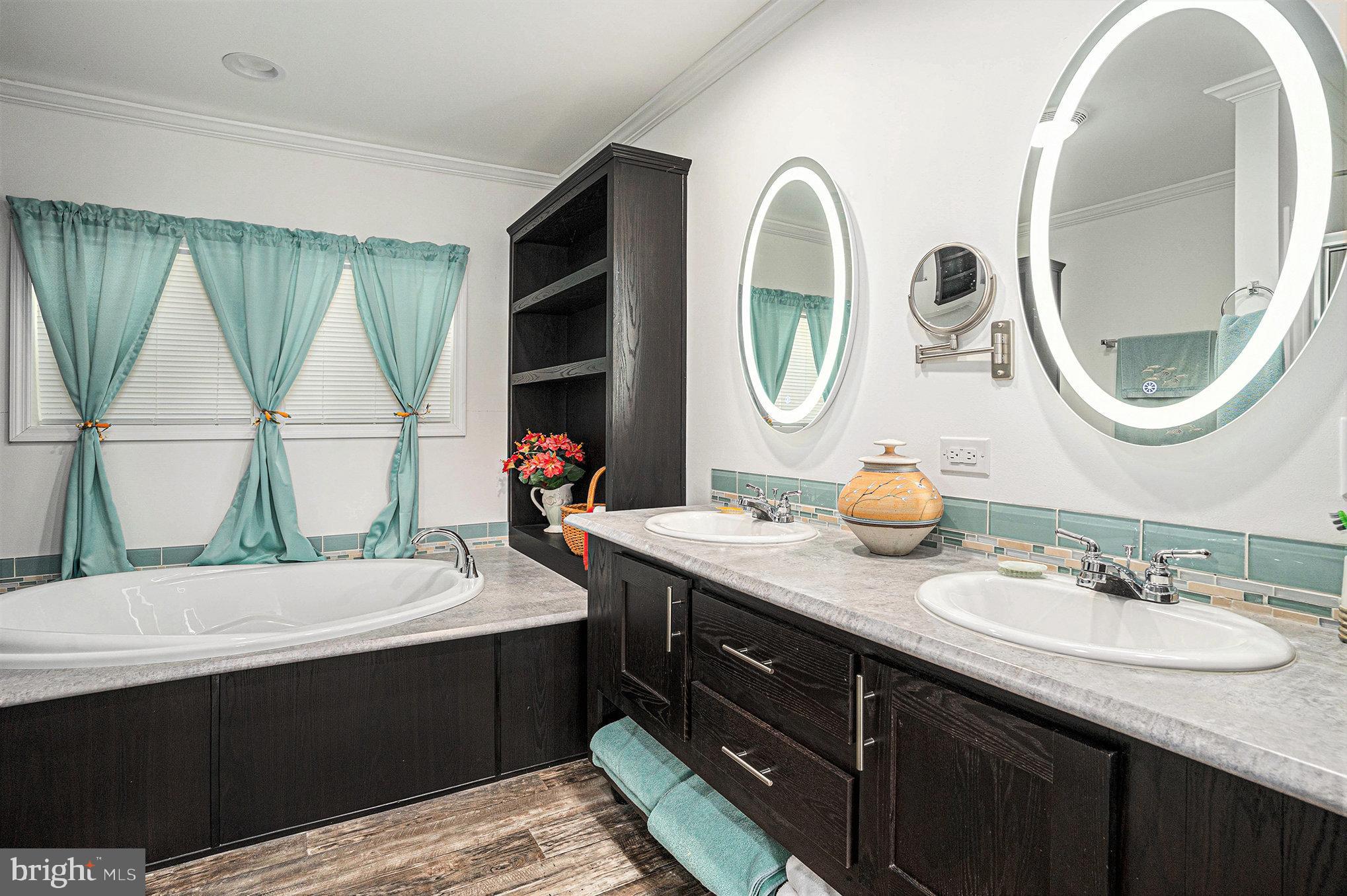 906 Lakeview Drive Green Lane, PA 18054 - Photo 21 of 37 a bathroom with a sink and a mirror