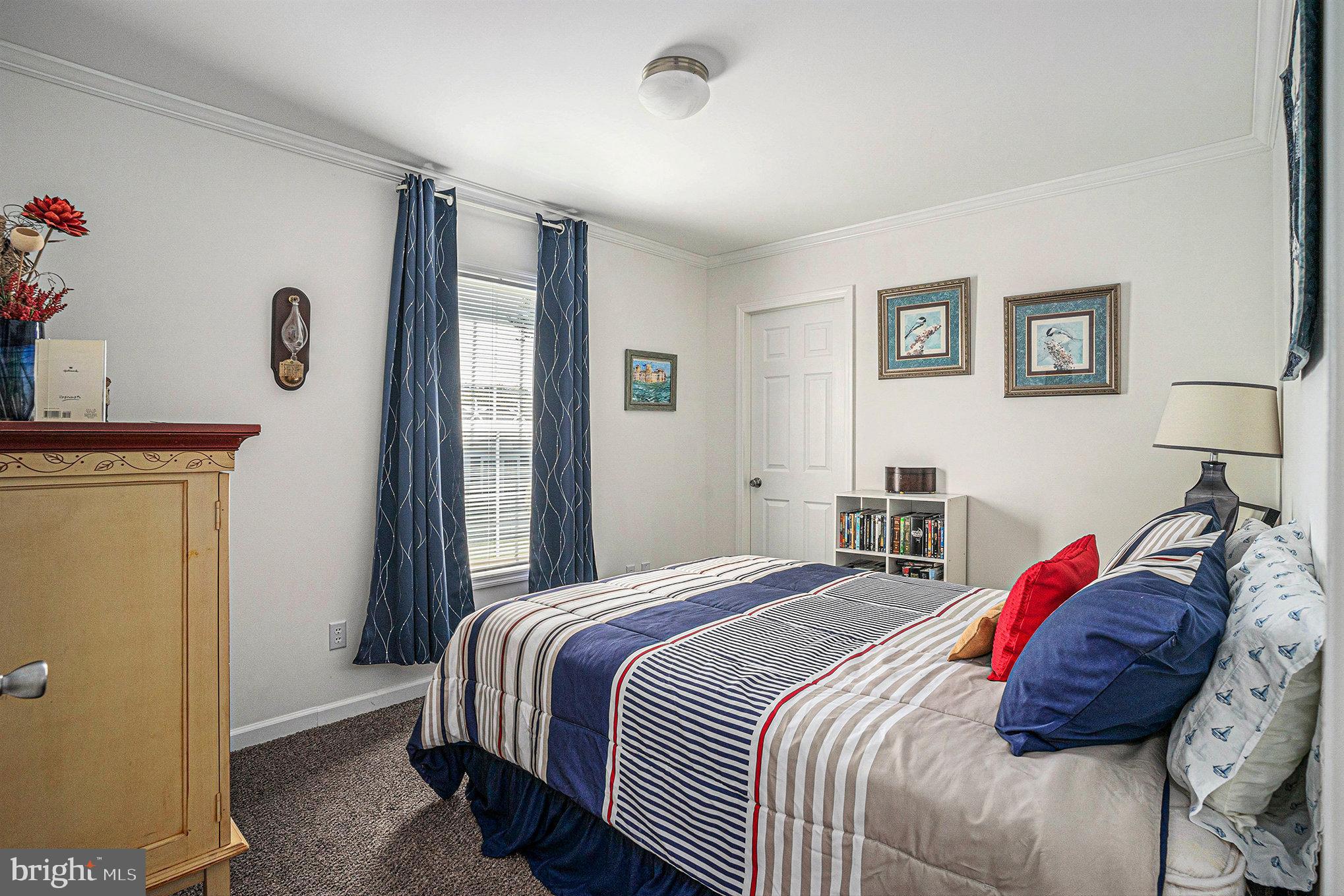 906 Lakeview Drive Green Lane, PA 18054 - Photo 25 of 37 a bedroom with a bed and a window