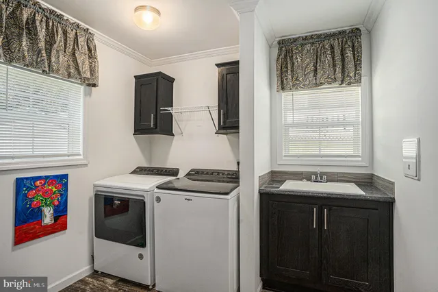 a kitchen that has a stove and a microwave