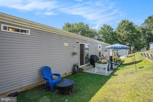 a view of a patio in backyard