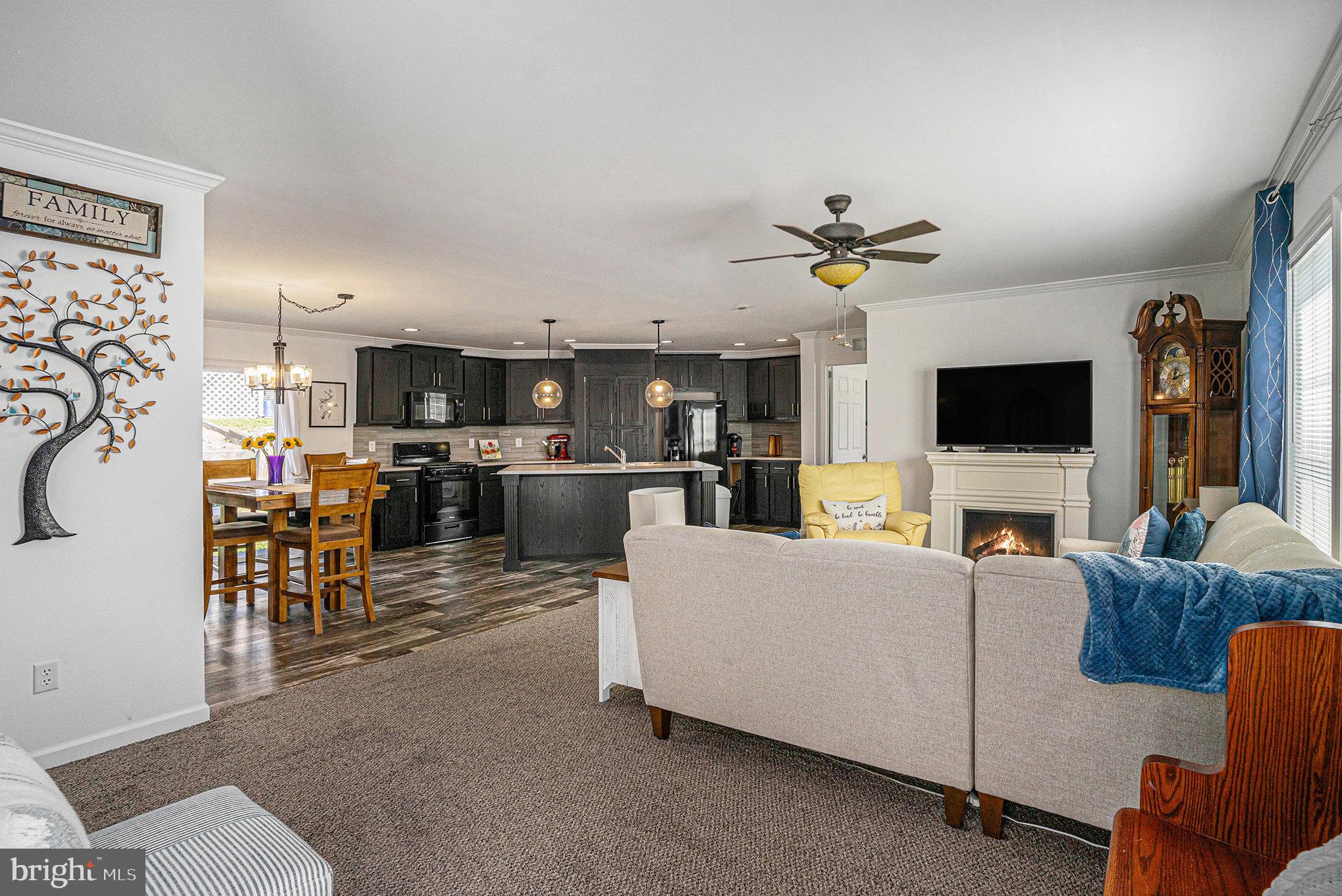 906 Lakeview Drive Green Lane, PA 18054 - Photo 3 of 37 a living room with furniture and a flat screen tv
