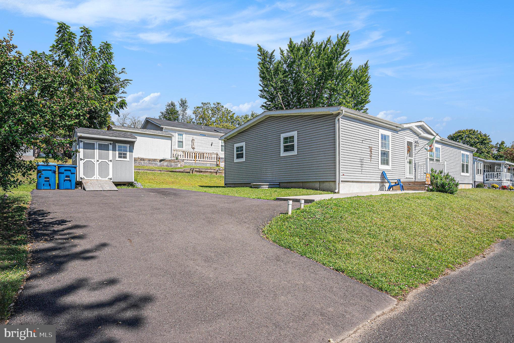 906 Lakeview Drive Green Lane, PA 18054 - Photo 31 of 37 a view of house with outdoor space and swimming pool