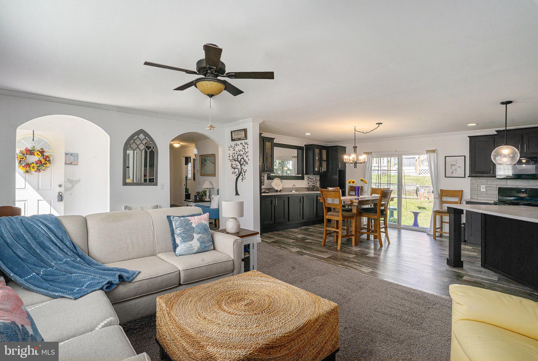 906 Lakeview Drive Green Lane, PA 18054 - Photo 8 of 37 a living room with furniture and a fireplace
