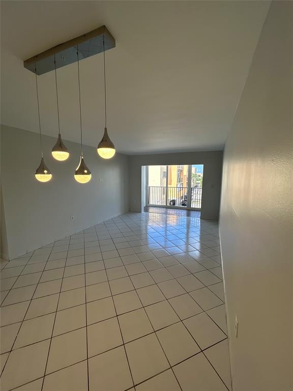 1855 West 60th Street, Unit 325 Hialeah, FL 33012 - Photo 2 of 18 a view of an empty room and window