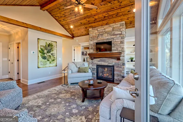 a kitchen with stainless steel appliances granite countertop a sink and cabinets