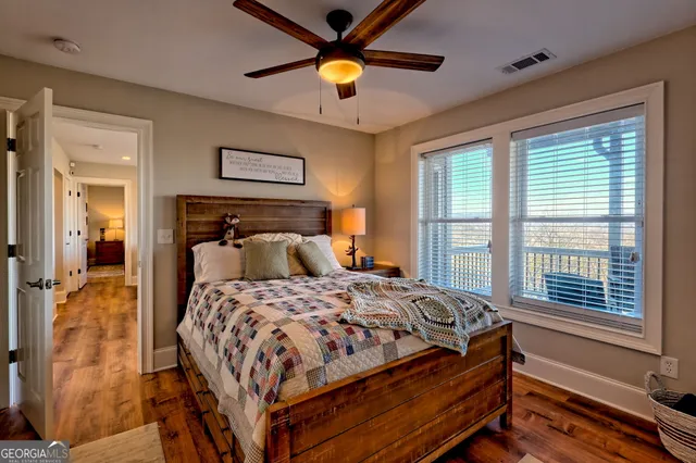 a front view of house with yard outdoor seating and barbeque oven