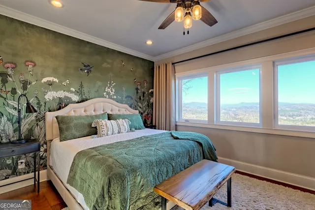 a view of roof with wooden floor and fence