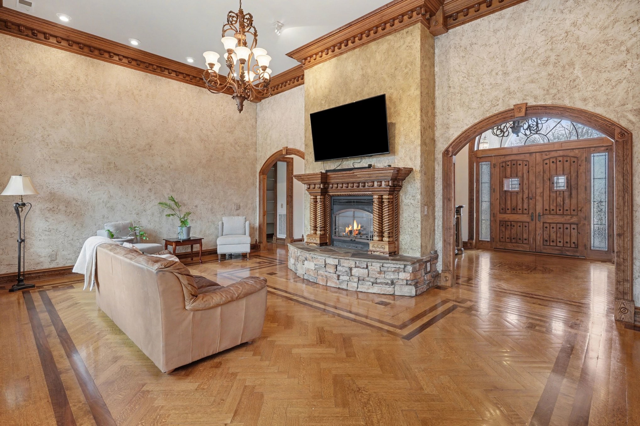 7699 County Line Road North White Bluff, TN 37187 - Photo 33 of 91 a living room with furniture a fireplace and a flat screen tv