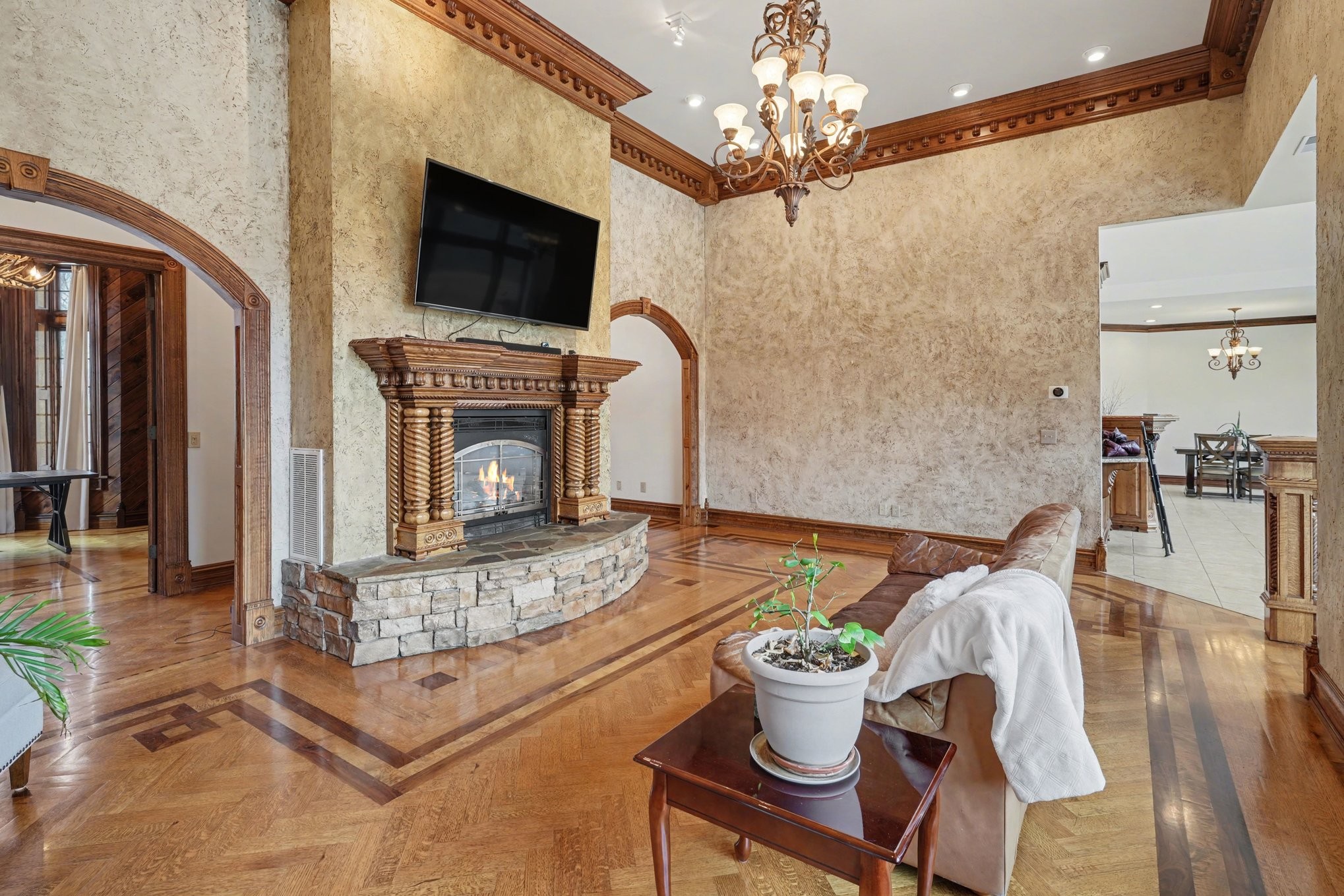 7699 County Line Road North White Bluff, TN 37187 - Photo 34 of 91 a living room with furniture a fireplace and a flat screen tv