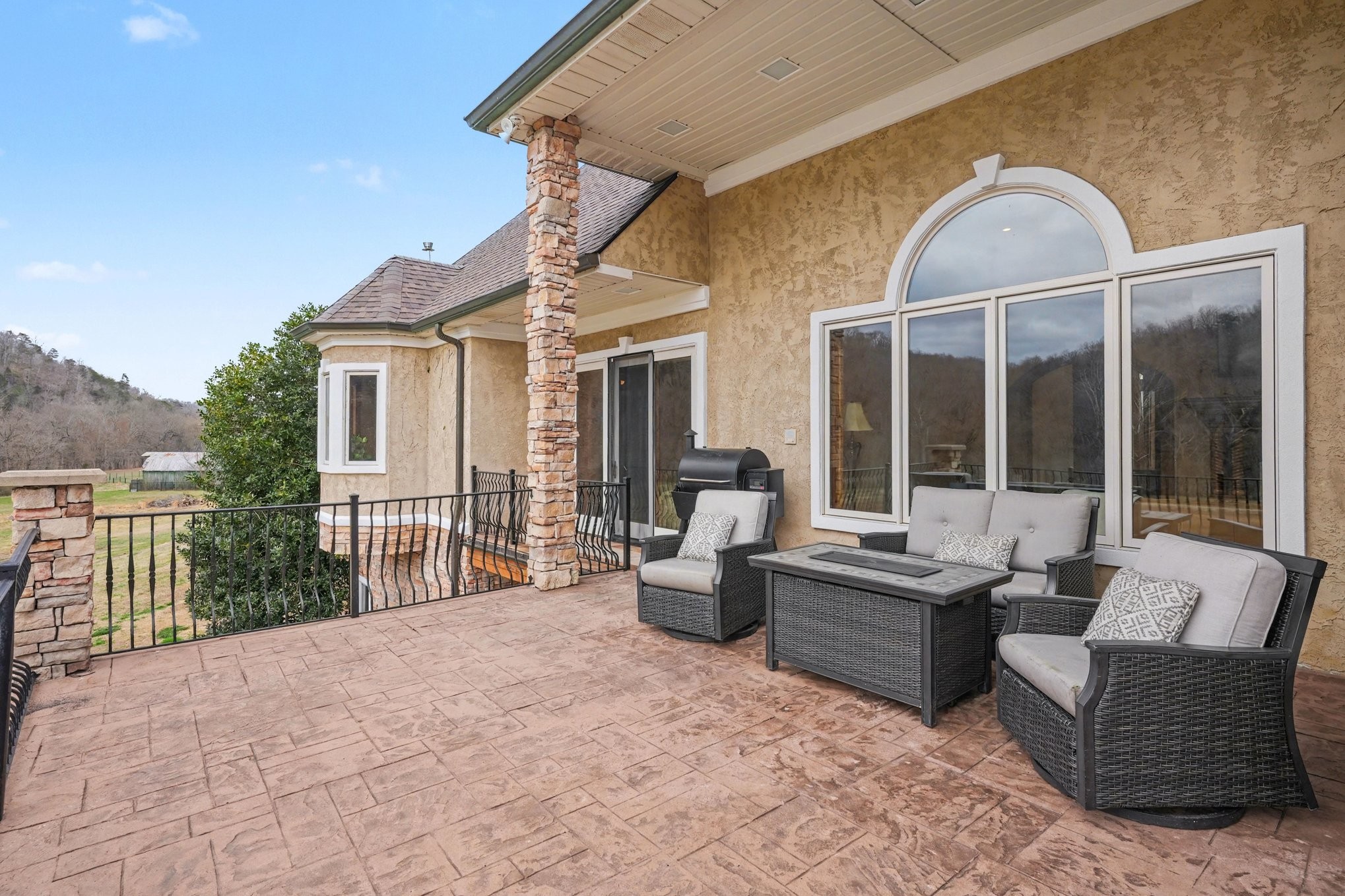7699 County Line Road North White Bluff, TN 37187 - Photo 42 of 91 a view of a patio with couches chairs and wooden floor