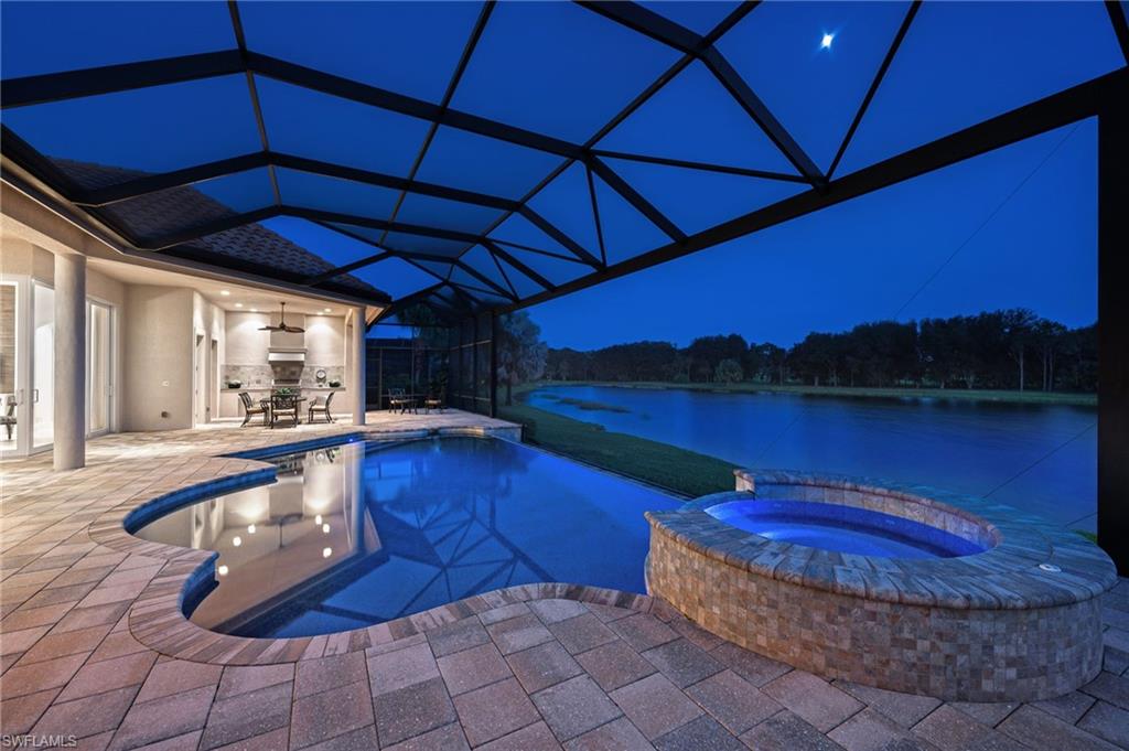 11978 Maidstone Court Naples, FL 34120 - Photo 32 of 44 Infinity Edge Pool and Spa-Night